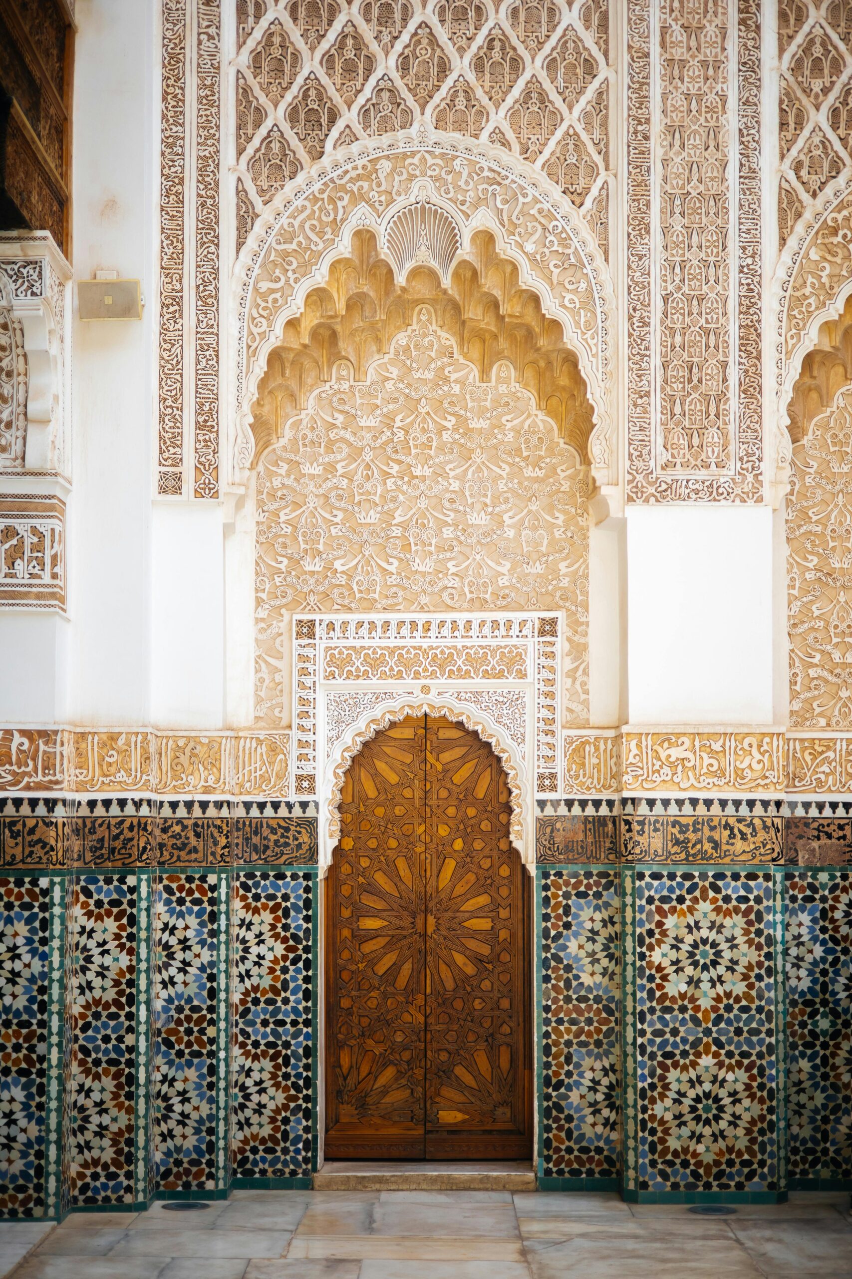Capture of ornate Moroccan architecture featuring elaborate patterns and tiles, highlighting cultural heritage.